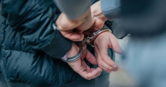 individual getting arrested