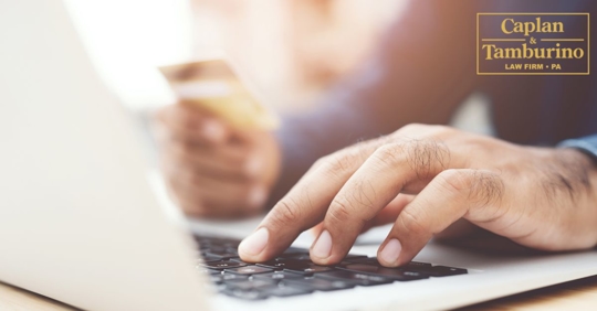 Person typing on laptop