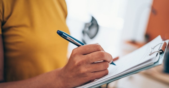 Woman filling out job application